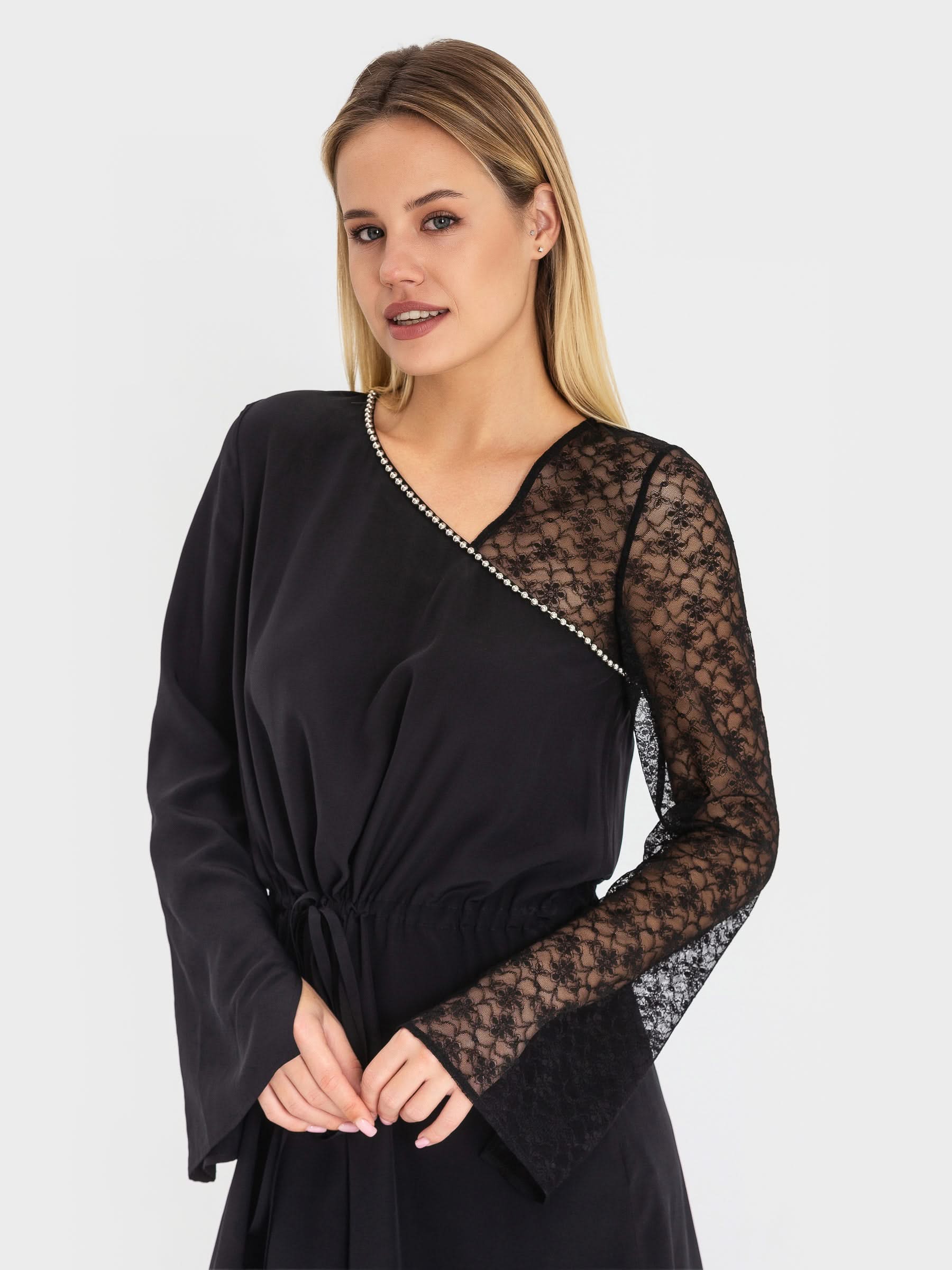dress made of natural silk adorned with lace