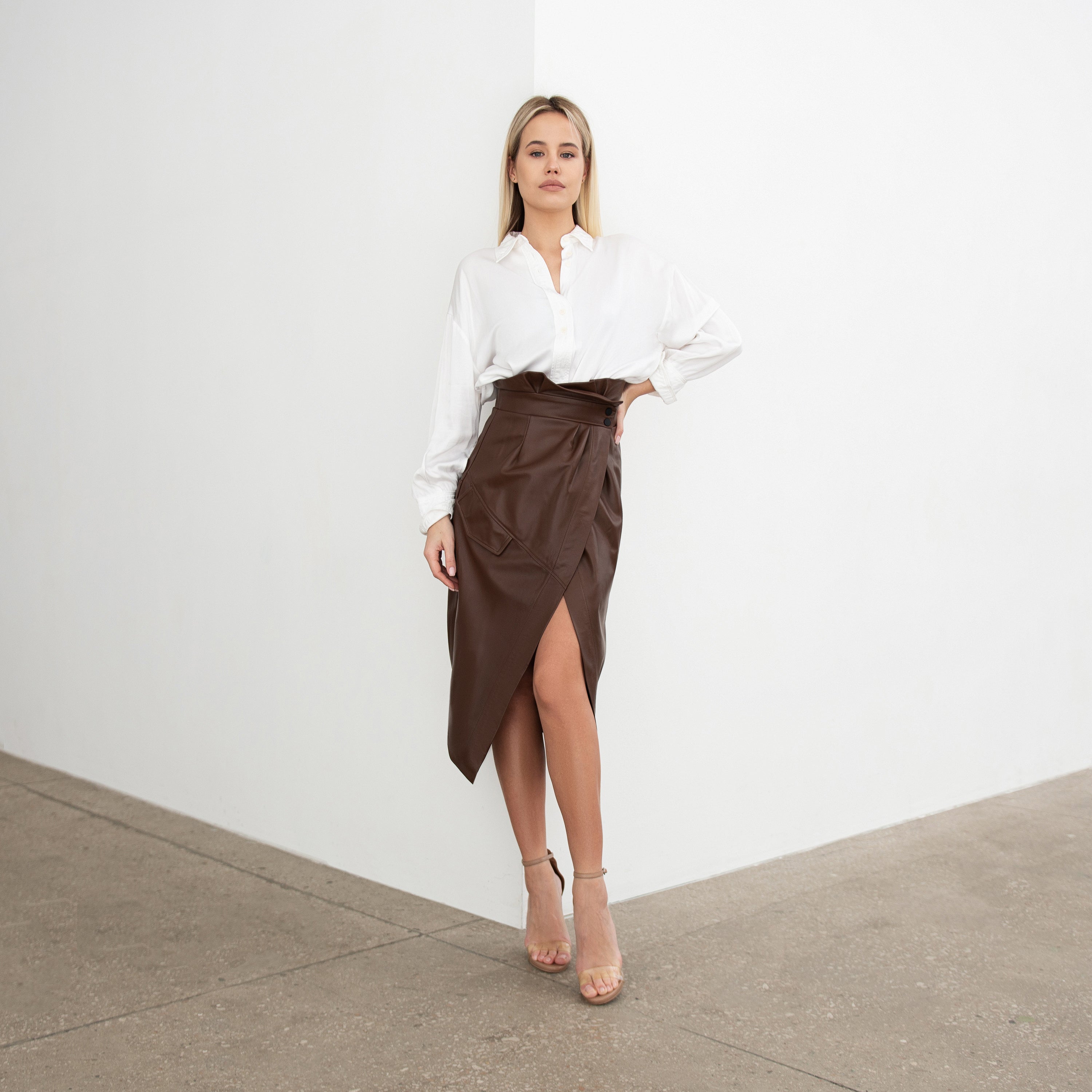 Leather skirt with a decorative flap