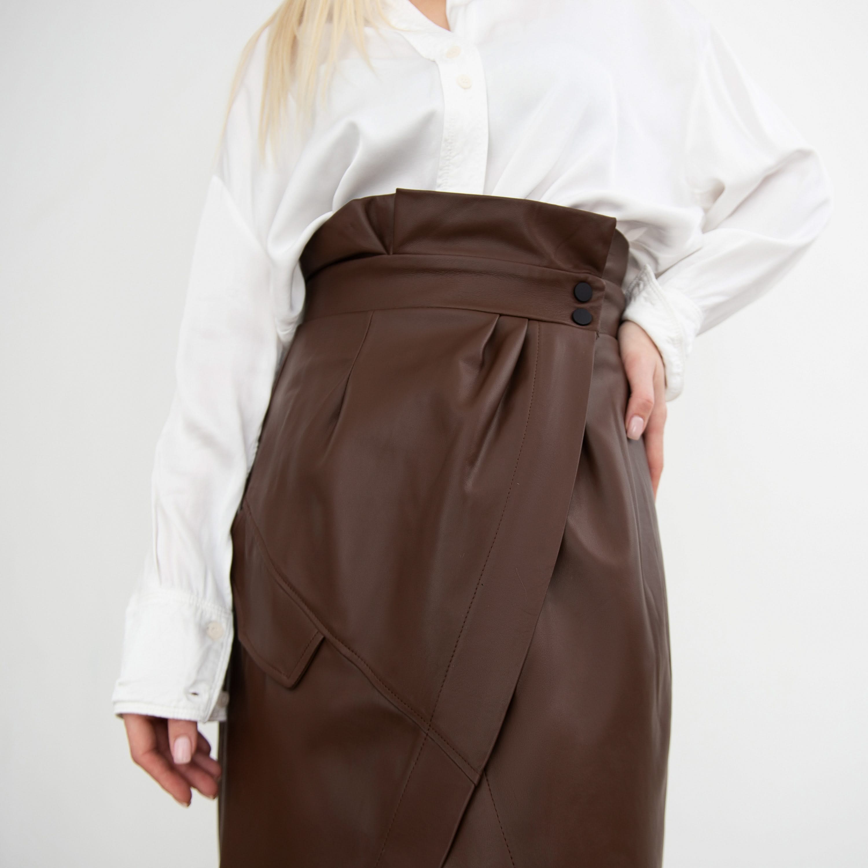 Leather skirt with a decorative flap