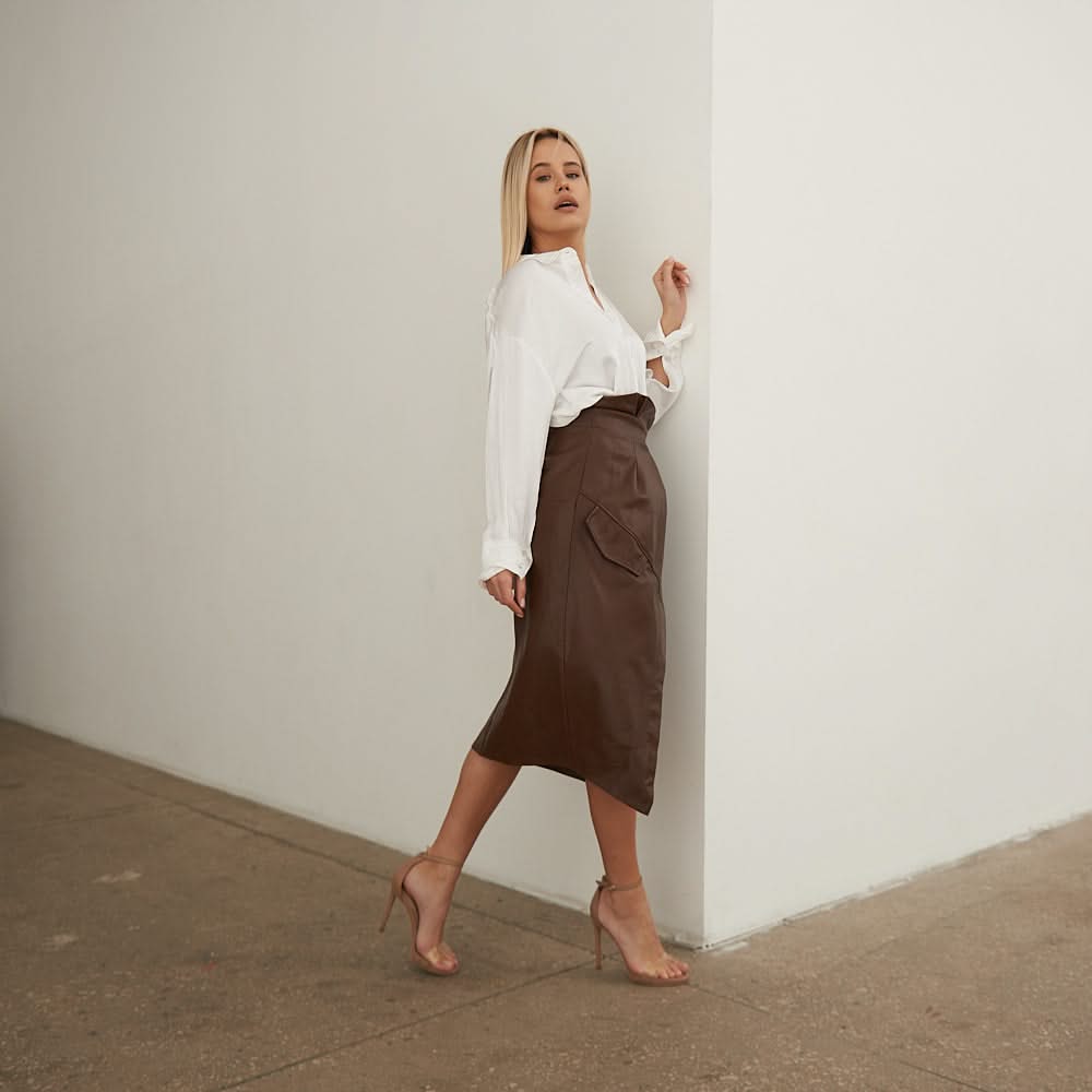 Leather skirt with a decorative flap