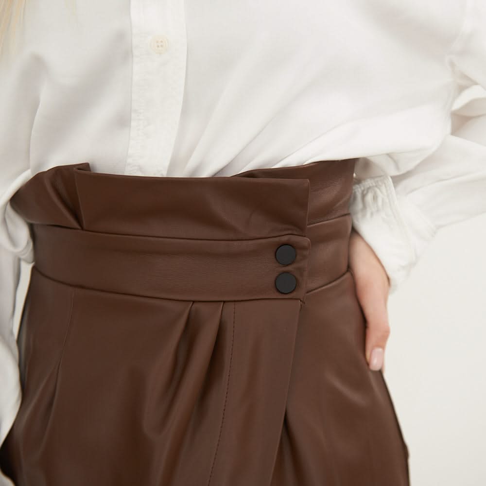 Leather skirt with a decorative flap