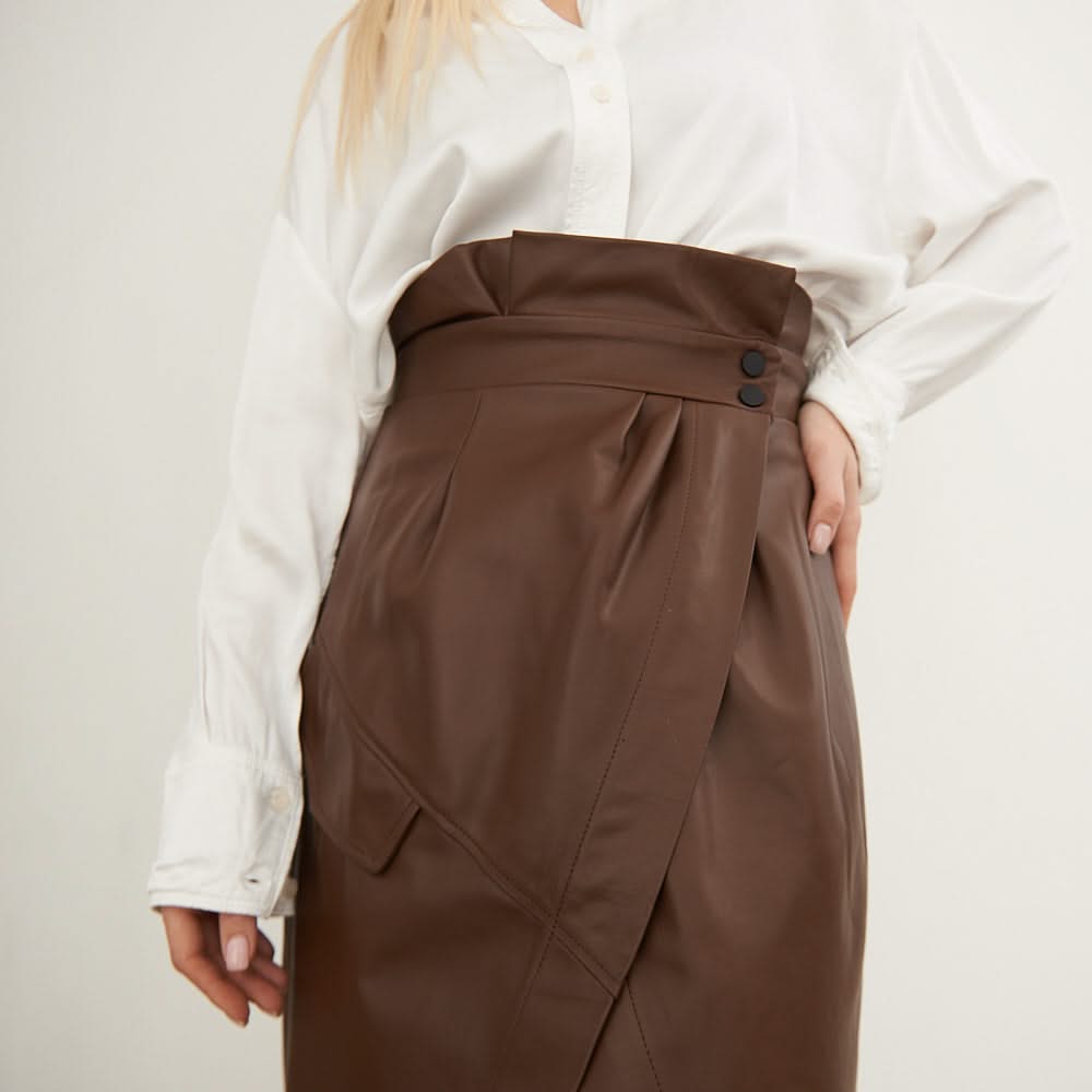 Leather skirt with a decorative flap