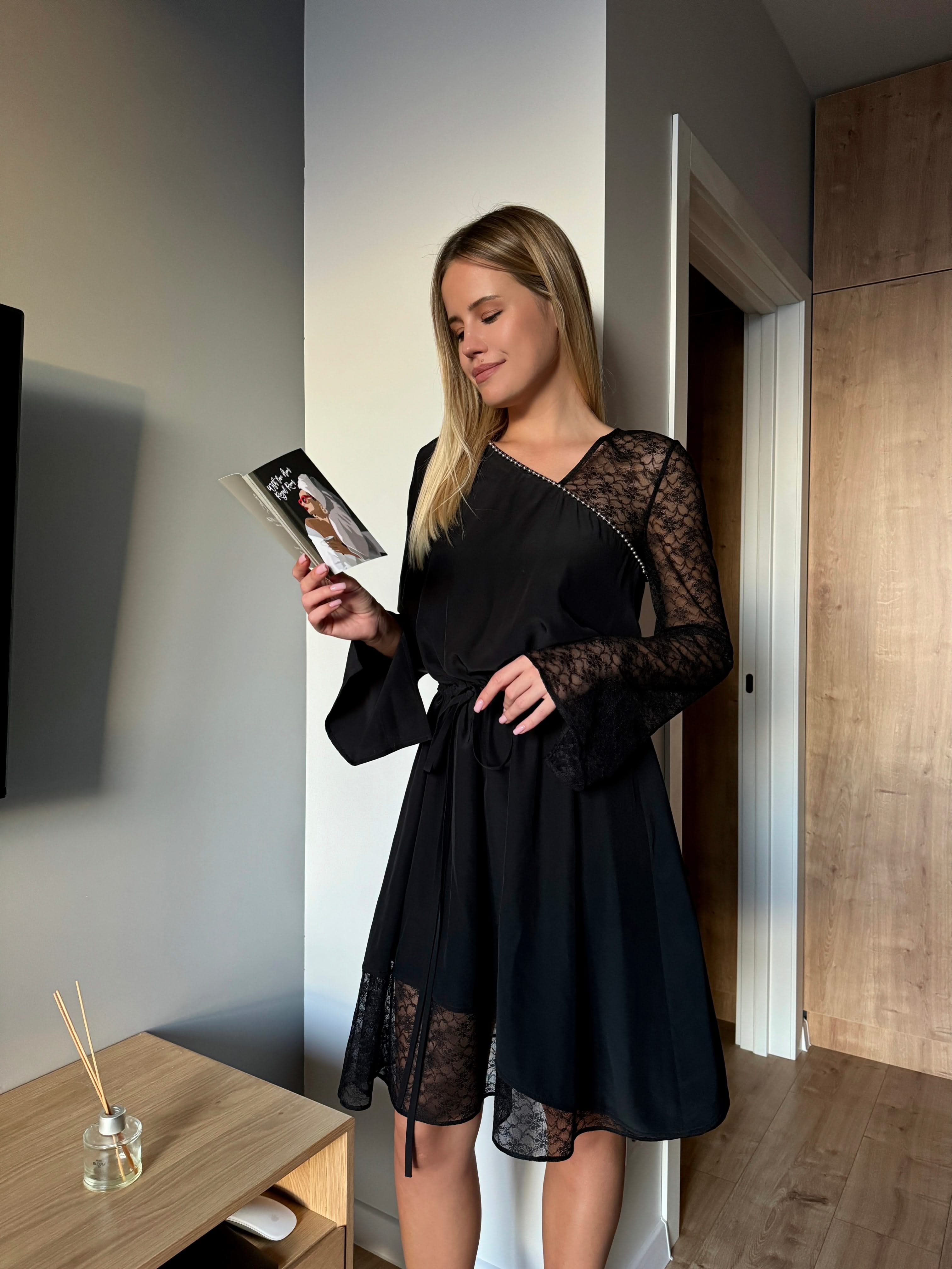 dress made of natural silk adorned with lace