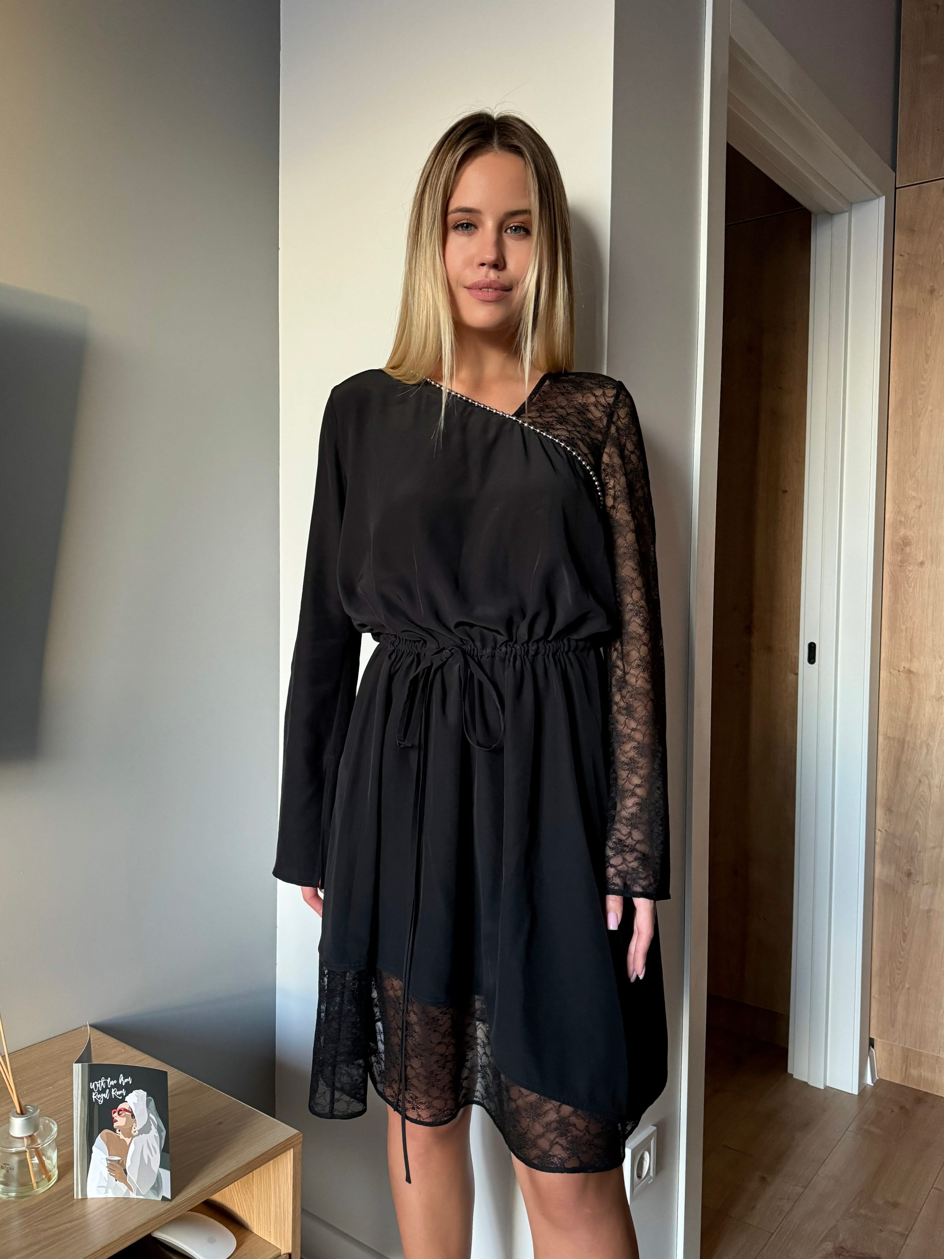 dress made of natural silk adorned with lace