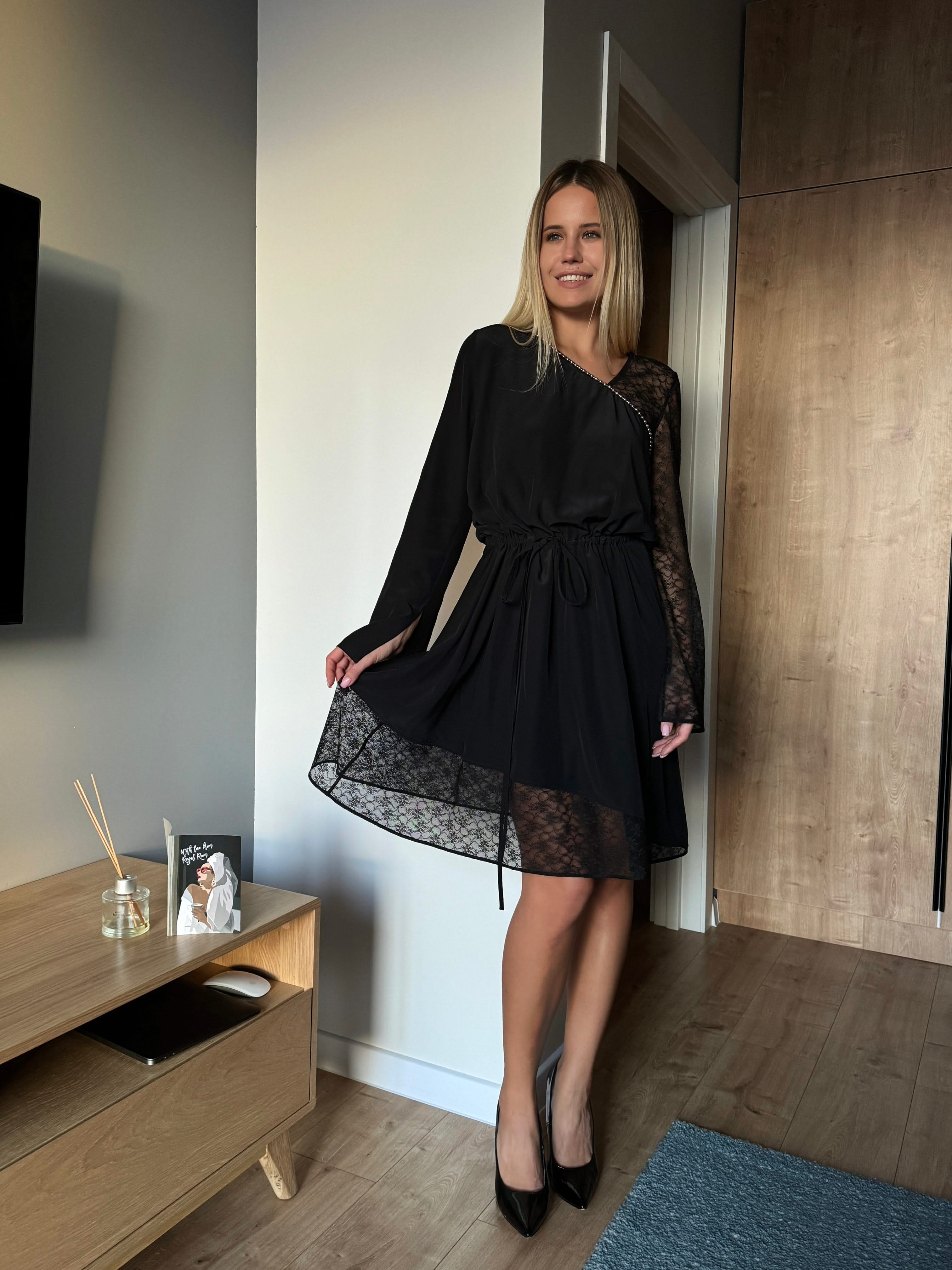 dress made of natural silk adorned with lace