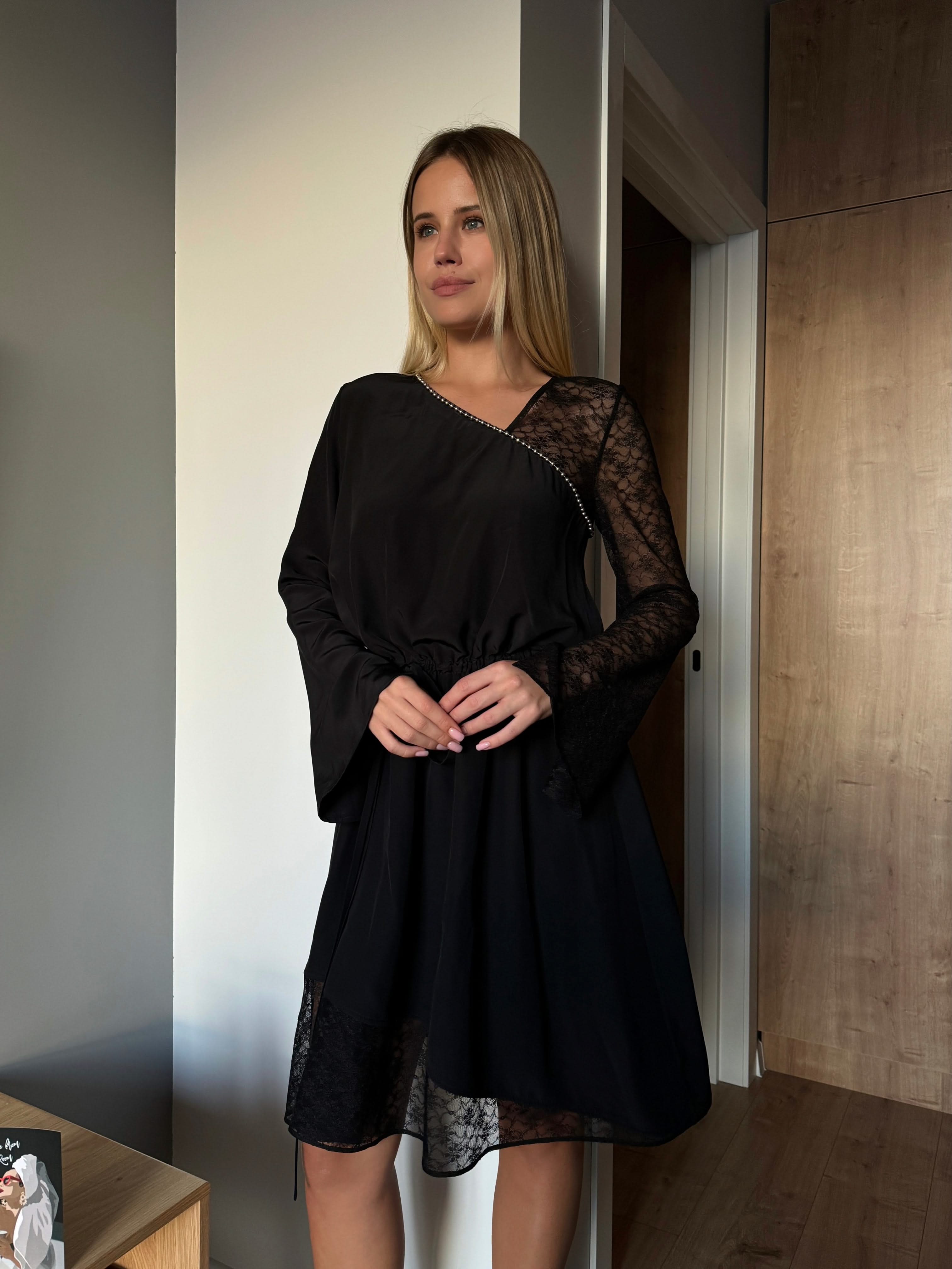 dress made of natural silk adorned with lace