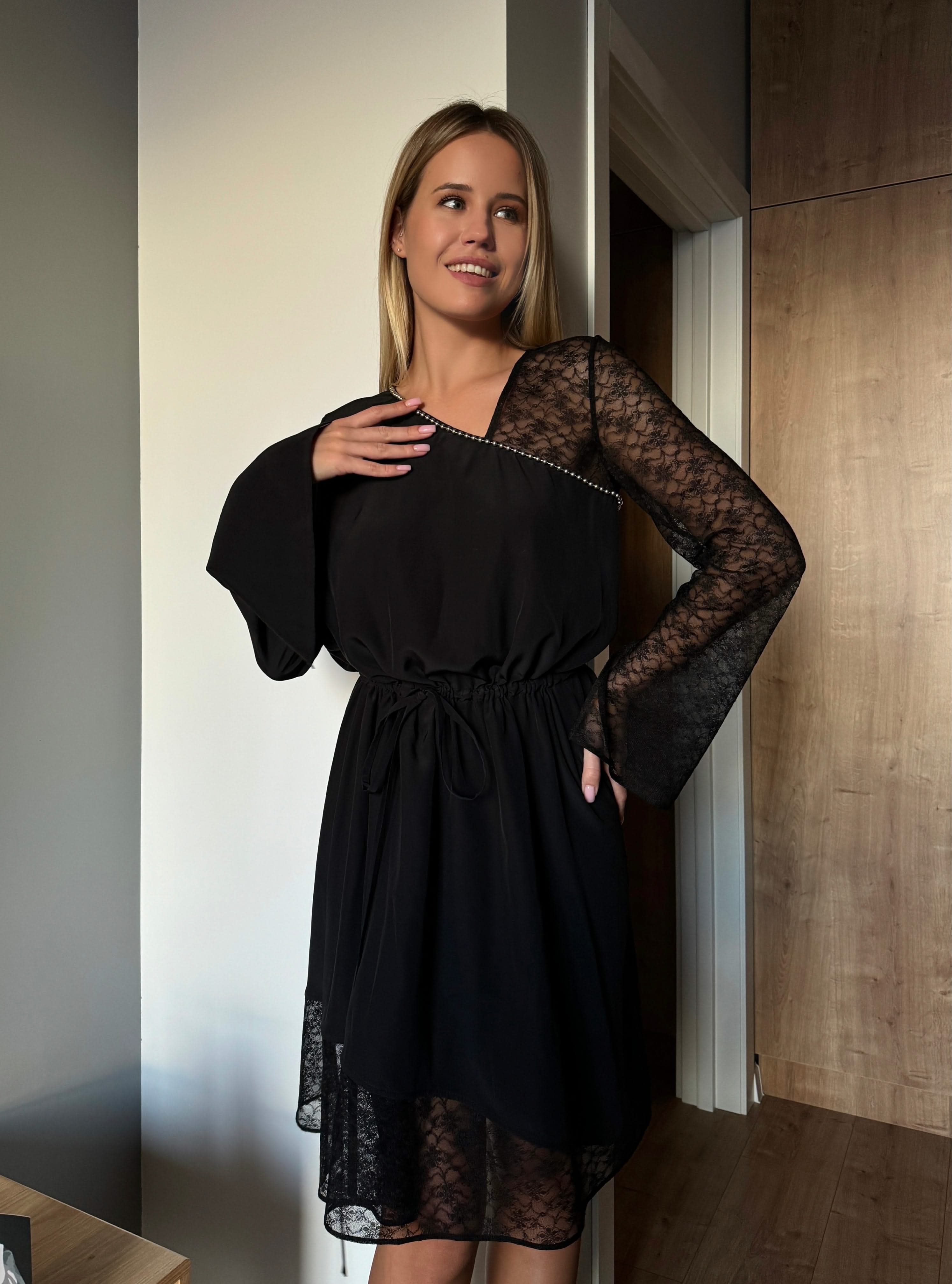 dress made of natural silk adorned with lace