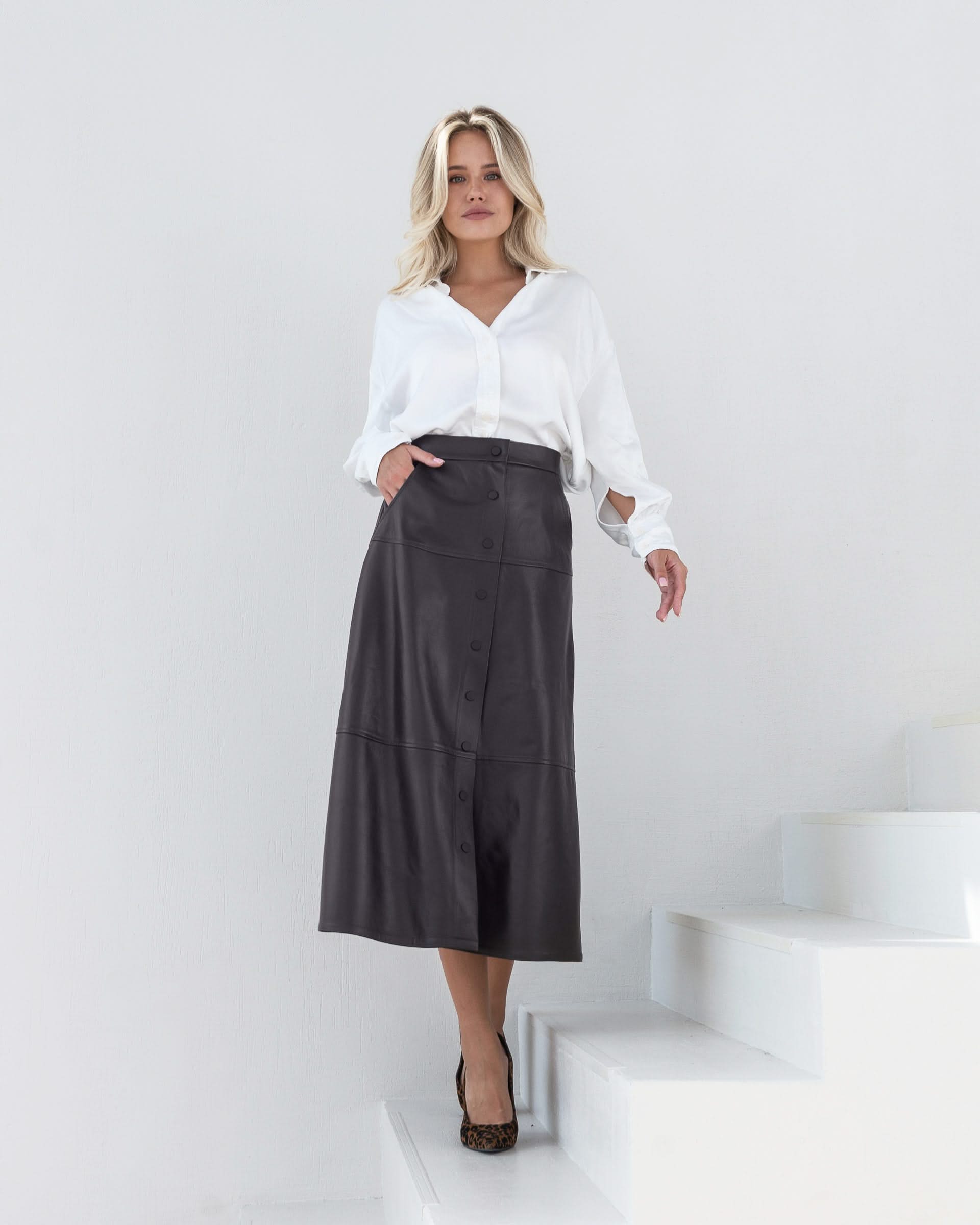 Sheepskin A-line skirt. Buttoned.