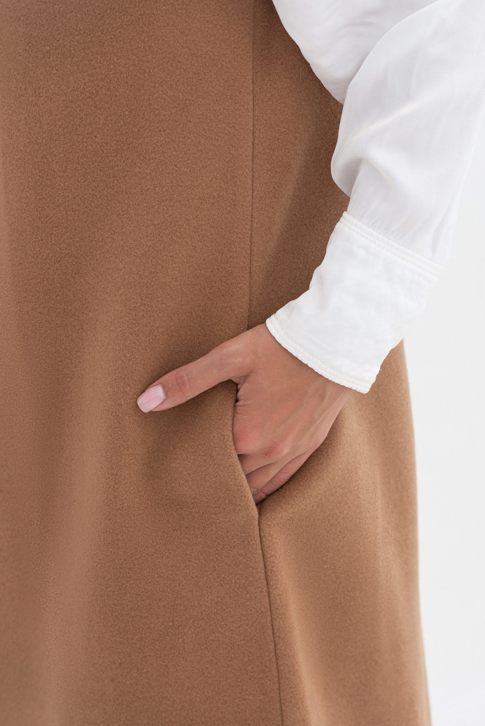 Sleeveless trench coat. Long.